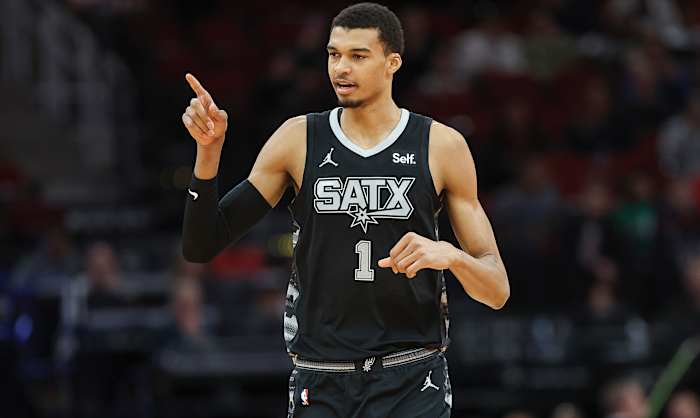 San Antonio Spurs center Victor Wembanyama (1) reacts after a play during the first quarter against the Houston Rockets at Toyota Center.